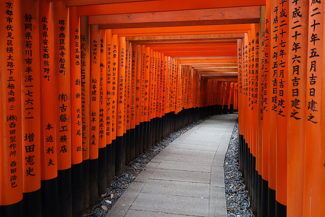 Rows of red torii gates at Fushimi Inari